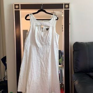 Beautiful A-line white, below the knee, dress